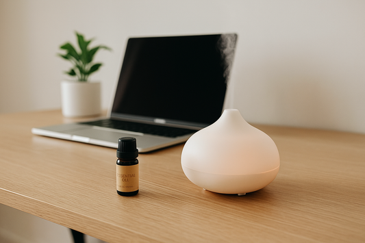 Focusory thumbnail showing a modern desk with aromatherapy diffuser, essential oil, and laptop for a calming productivity setup