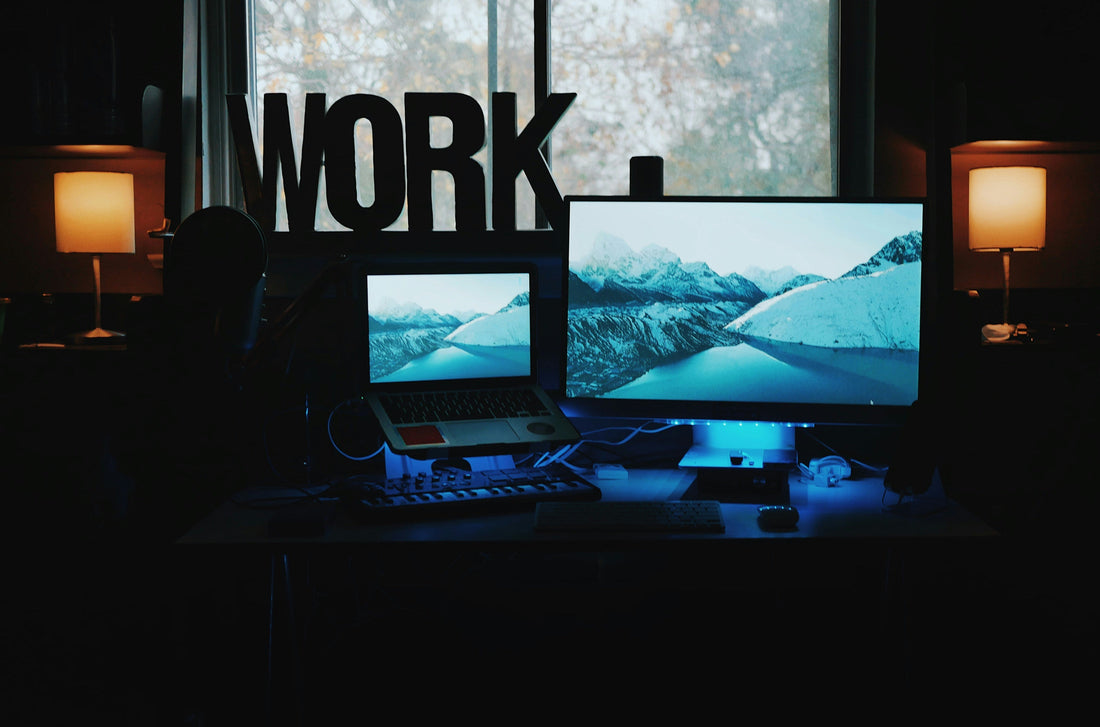 Focusory thumbnail of a professional working at a tidy desk with notebook and lamp, representing productivity and flow state
