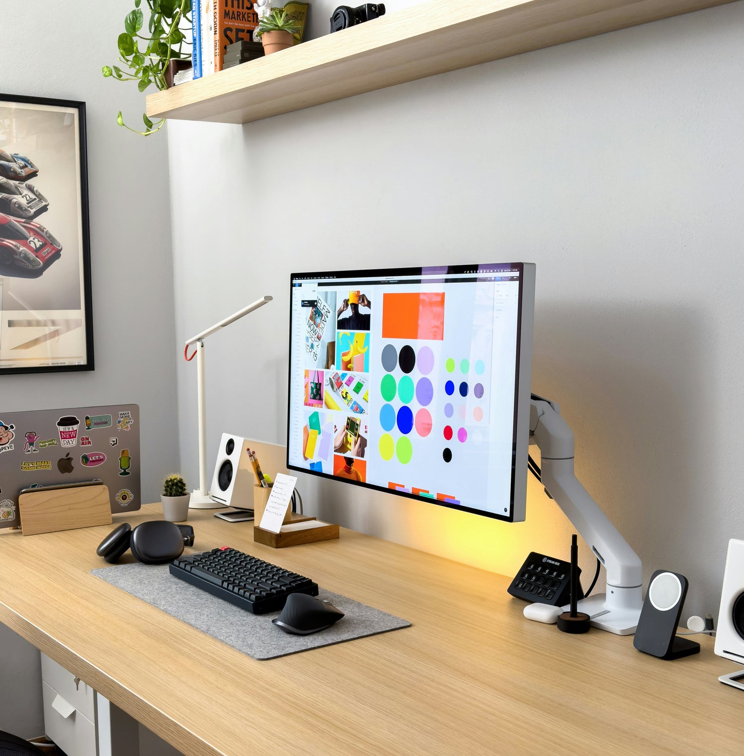 Ergonomic desk setup with standing desks and risers