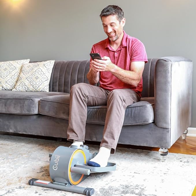 Cubii GO - Under Desk Elliptical Bike Pedal Exerciser, with LCD Fitness Tracker Screen, Adjustable Resistance, Work from Home Fitness, Built-in Wheels and Portable Expanding Handle