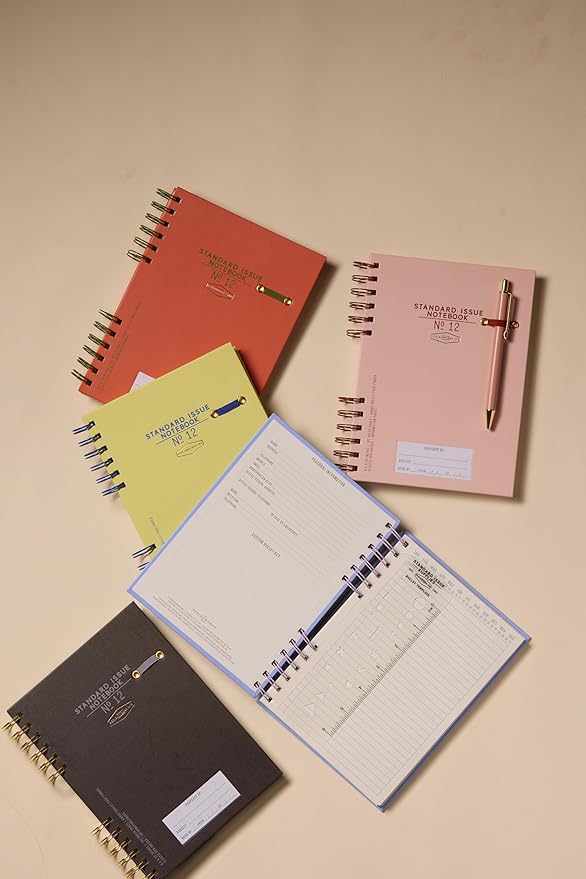 DesignWorks Ink Standard Issue Notebook No. 12 – 6" x 8.25" Undated Daily Planner & Writing Journal, 192 Lined Pages, Elastic Pen Holder, Small Spiral Notebook for Work & Journaling - Dusty Pink