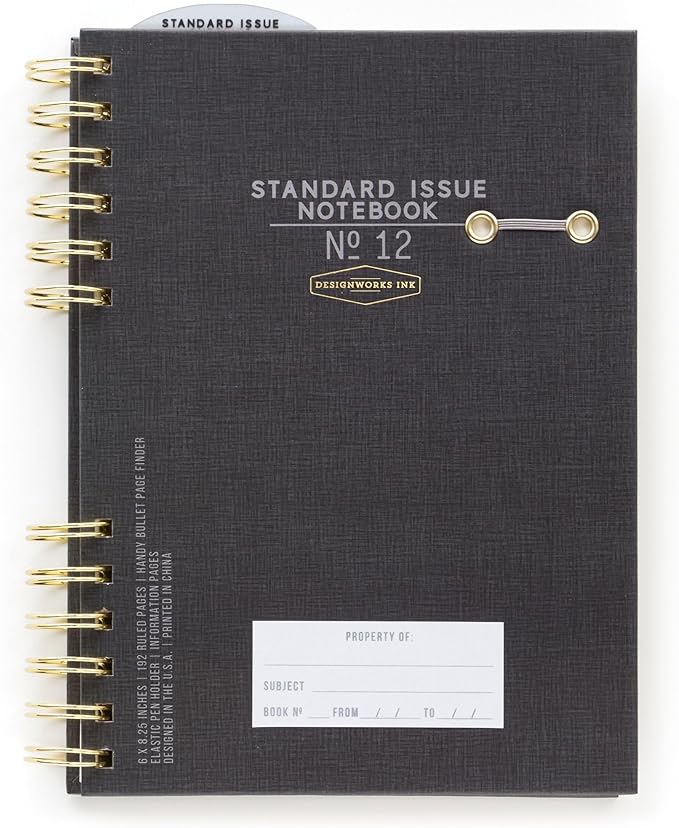 DesignWorks Ink Standard Issue Notebook No. 12 – 6" x 8.25" Undated Daily Planner & Writing Journal, 192 Lined Pages, Elastic Pen Holder, Small Spiral Notebook for Work & Journaling - Black