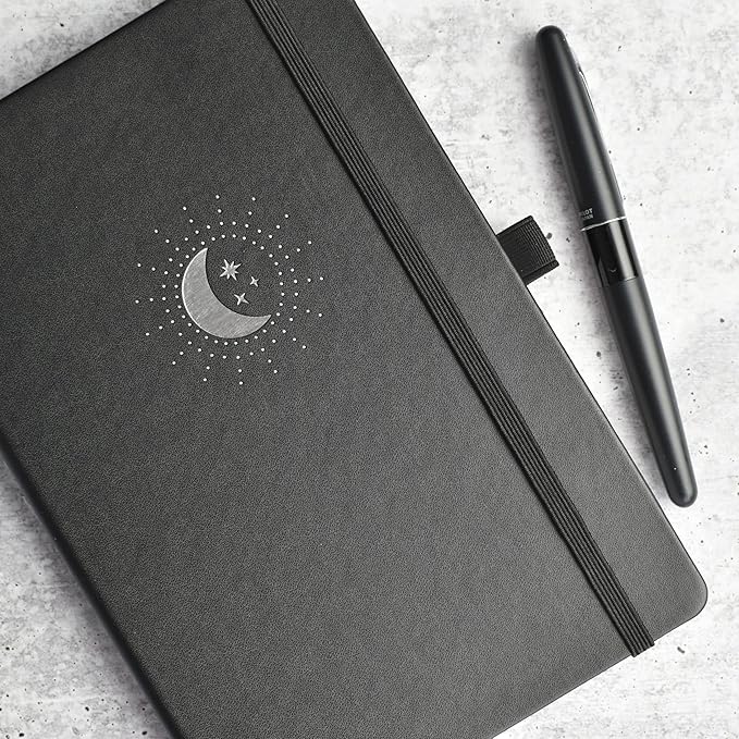 RICCO BELLO Hardcover Dot Grid Journal Notebook, Lay Flat Design, Pen Holder, 5.7 x 8.4 inches, Thick 160 gsm Paper, 80 sheets/160 pages (Black Moon Stars)